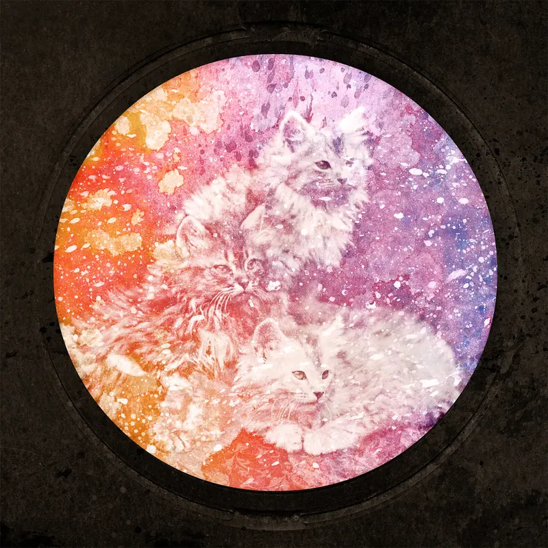 A round acrylic painting of two pale fluffy kittens dissolving into splashes of orange, pink and violet paint, hung on a dark wall